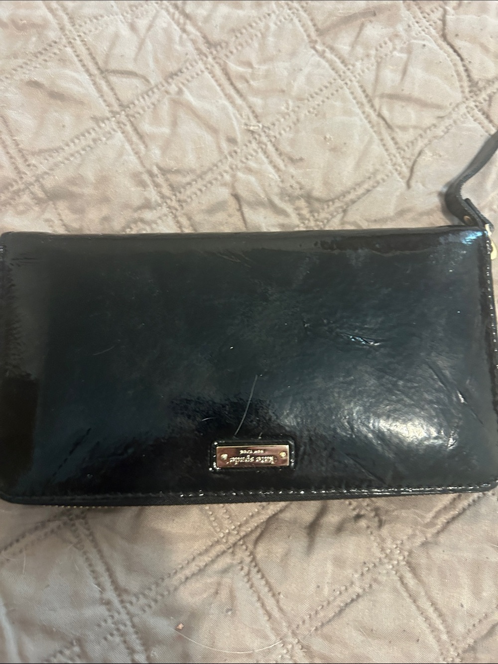 kate spade black patent leather wristlet clutch with gold logo plaque